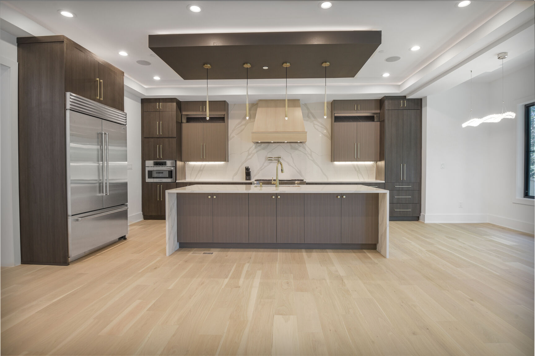 Chef kitchen with marble island