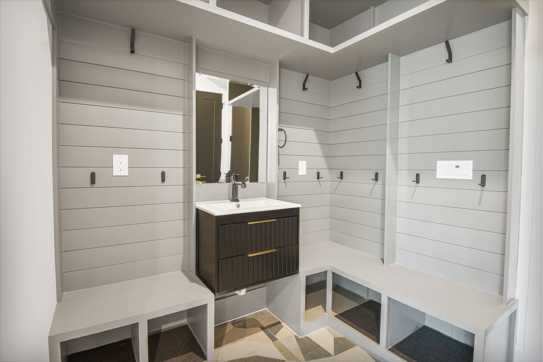 Mudroom with shiplap walls